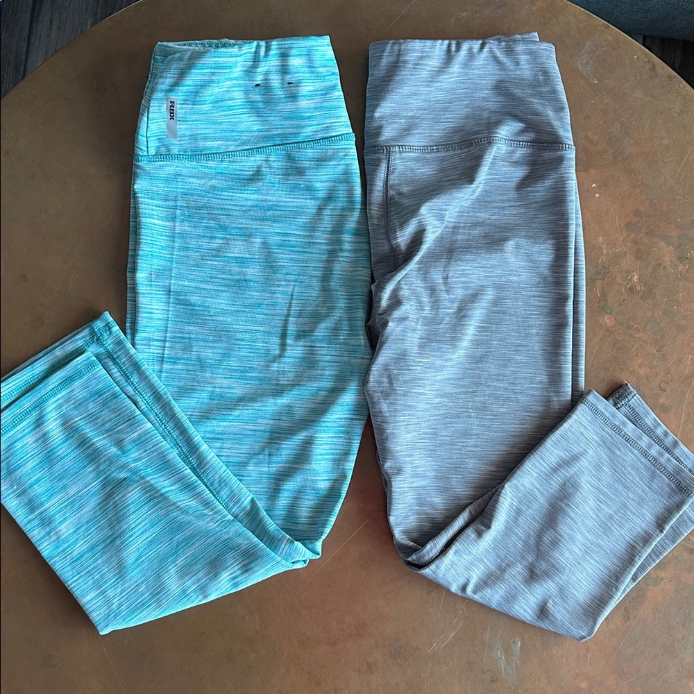 Two pairs of RBX medium capri’s: teal and gray